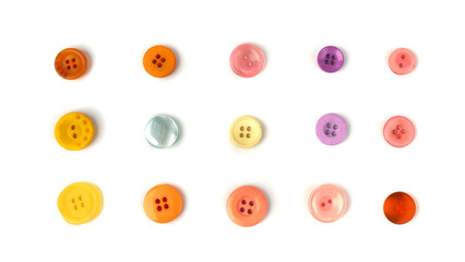 Multicolored sewing buttons isolated. Plastic sew buttons of different colors and sizes