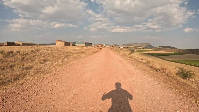 dirt road entering Reznos village, comarca of Campo de Gomara, province of Soria, Castile and Leon, Spain