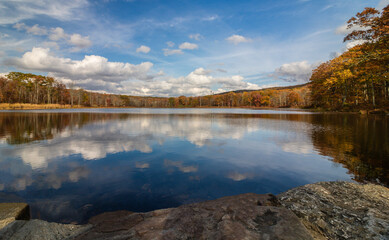 Sawmill Lake in High Point State Park, NJ, on a beautiful Autumn afternoon surrounded by colorful fall foliage