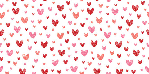 Seamless vector pattern background with hearts in various sizes in shades of red, pink, and rose ideal for Valentine's Day themes, romantic gift wrap, textile prints, and festive