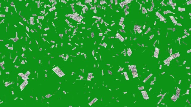 One hundred dollar bills falling down on green screen background. Money rain down from the green sky. Money explosion and rain overlay. It's like a big procession of money has come out of the sky.