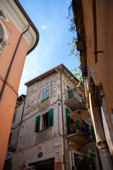 Street view from famous italian old town Limone on the coast of Garda lake