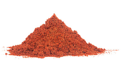 Pile of red chili pepper powder isolated on a white background. Ground pepper.