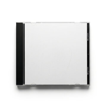Blank white CD jewel case with black spine and scratched plastic texture isolated on white background top view