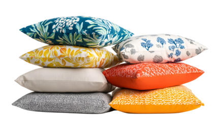 stack of colorful throw pillows with floral and geometric patterns