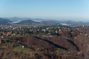 Gradina viewpoint at mountain Zlatibor offering beautiful view of city of Zlatibor in valley at morning, visit Serbia