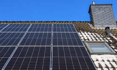 Solar panels generating clean energy on residential roof