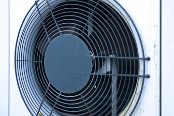 Outdoor air conditioning unit fan grill cooling system