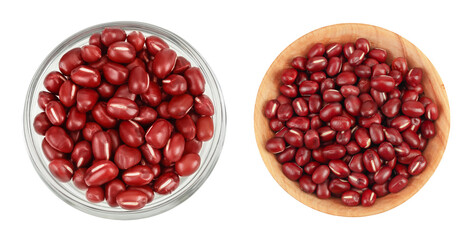Red adzuki beans in glass and wooden bowl isolated on white background. Top view. Flat lay.