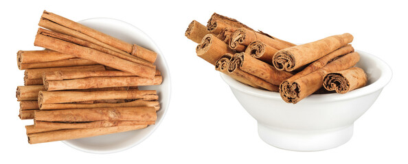 Cinnamon sticks in ceramic bowl isolated on white background with full depth of field. Top view....