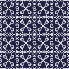 Fototapeta premium Popular Navy Blue and White Abstract Geometric Seamless Ikat Pattern Design Background for Textile Fabric Printing, Wallpaper, and Modern Digital Art Template.