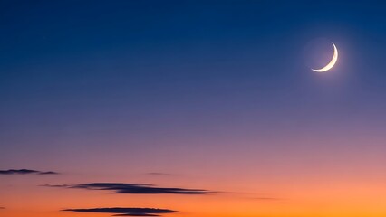 Crescent moon shining brightly in a serene twilight sky with orange and purple hues