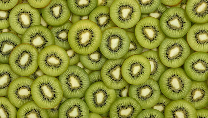 Flat lay of kiwi fruit slices, perfect for vegetarian diet promotions, food blogs, and healthy eating content. Suitable for web design.