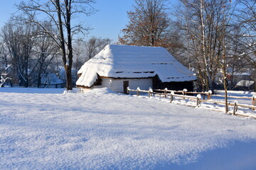 Old abandoned village, wooden houses, winter, snow, frost, tradition, difficult living conditions, Eastern Europe