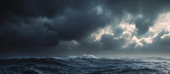 Dramatic seascape with dark storm clouds looming over turbulent ocean waves