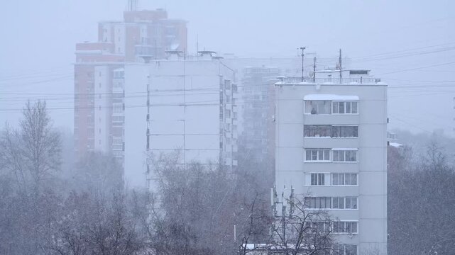 Snowfall in winter day after hurricane frances in Moscow, Russia
