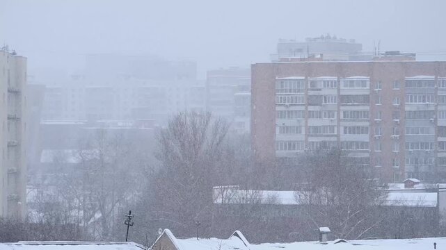 Snowfall in winter day after hurricane frances in Moscow, Russia