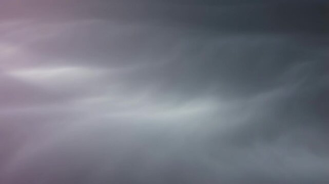 Gentle cloud movement across a soft purple sky in three seamless frames