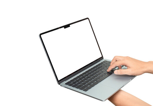 A person's hands holding and using a modern, thin silver laptop with a blank white screen (mockup). Isolated on a white background, emphasizing technology, online work, digital communication, and port
