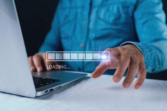 Businessman hand typing on laptop with virtual loading bar. Concept of downloading data, software update, fast internet speed, digital progress, system installation and waiting for connection.