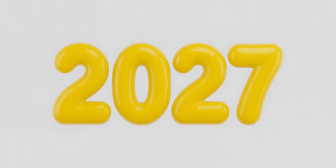 Bright yellow glossy inflatable numbers spelling out '2027', symbolizing the future year and new beginnings