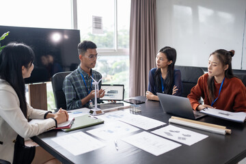 Solar panels green energy Business people working in green eco friendly office business meeting creative ideas for business eco friendly professional teaching corporate people sustainable electricity