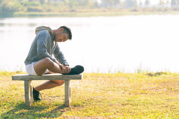 The young man experienced leg pain after exercising, indicating injury and discomfort from sports.