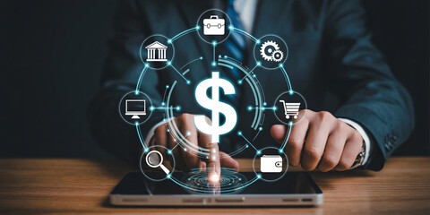 Businessman interacting with digital finance icons on tablet screen