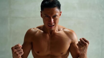 Intense fitness journey: determined man prepares for gym workout