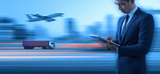 Businessman connecting with online data for cargo freight transport, airplane, and truck delivery across global supply chain