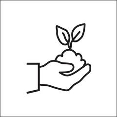 Hand holding a plant