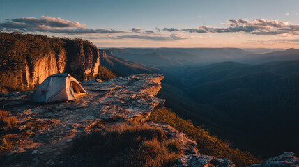 Camping adventure at sunrise overlooking scenic cliff nature landscape photography peaceful wilderness