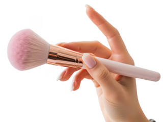 Hand holding pink makeup brush isolated on transparent background