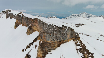 Snow mountain range landscape with clouds Alps