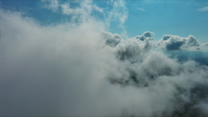 Clouds and blue sky, flying in clouds