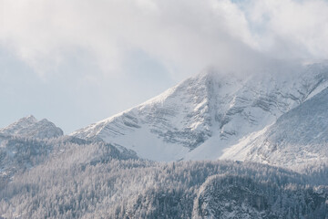 Warscheneck mountain in snowy and windy landscape in the pyhrn priel region
