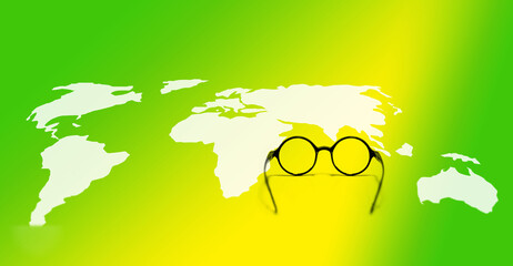 Eyeglasses on white world map on green background, Looking for better way to our green earth concept