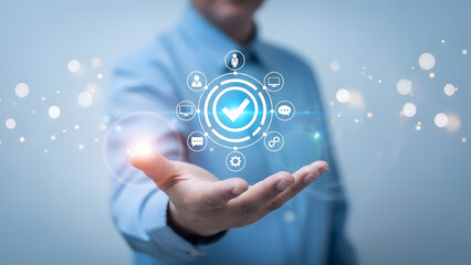 Business concept of successful strategy and achieved goals with a checklist and confirmed status in businessman's hand