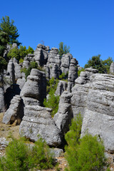 Majestic view of the valley with beautiful rock formations on an autumn day. They look like several standing men, so people called them "Land of Avatar". Selge, Manavgat, Antalya