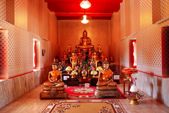 Phetchaburi Province,Thailand &ndash; 30th November 2025: Many gold buddha statue in church background at Wat Tanod Luang, Phetchaburi, Thailand.