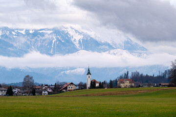 Parish Church of Saint Margaret Towered by Kamnik-Savinja Alps