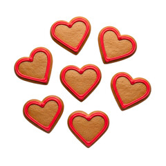 Fototapeta premium A collection of heart-shaped cookies with red icing on a white background