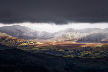 Dramatic sky over the rolling hills of Killarney National Park in Ireland.