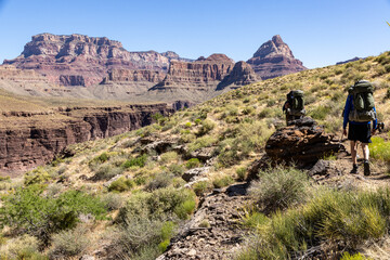 Backpackers hiking along the Grandview Trail in Grand Canyon National Park, Arizona, USA
