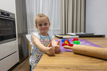 Family culinary traditions mother and daughter cooking biscuits together