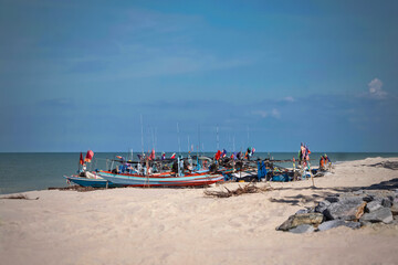 Small fishing boats, shores on the coast