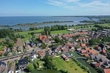 Drone photo of the village Onderdijk, near Medemblik. Surrounded by many ponds and grassland.
