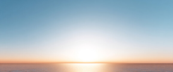 Fototapeta premium Calm ocean horizon at sunrise with clear sky and gentle water reflecting soft morning light in peaceful seascape
