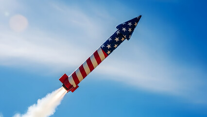 Firework rocket launching with American flag design against blue sky  