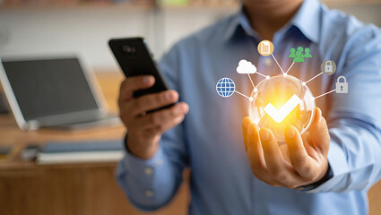 Businessman holding smartphone with glowing security icons and checkmark